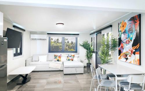 2 Bedroom PH Fully Renovated Beachfront Retreat with Private Patio & Breathtaking Ocean Views