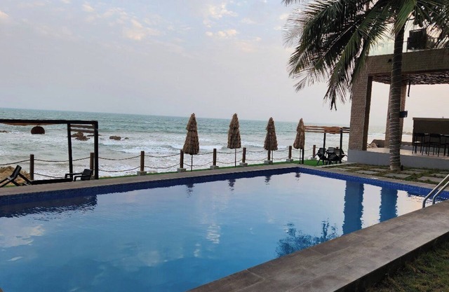 3-bedroom luxury beach villa in serene Ghana with AC, WiFi. Enjoy relaxation