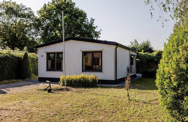 4-person family bungalow on a holiday park near the sea in Baarland