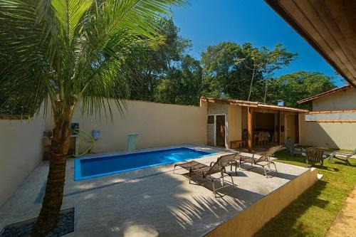400 m te Separam das Areias da Praia de Boraceia, casa com piscina aquecida para ate 12 pessoas