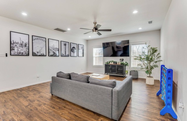 4BR home in Dallas with modern amenities, private yard, and great location!