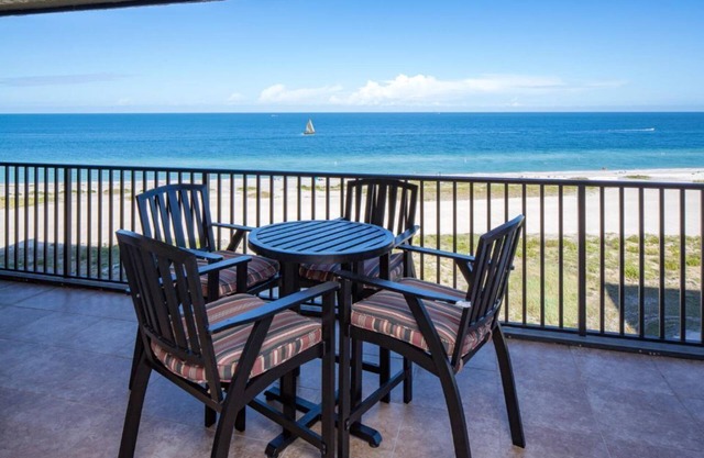 A "10" on 10 - Beachfront Condo w/180° Views of the Water & Private Balconies