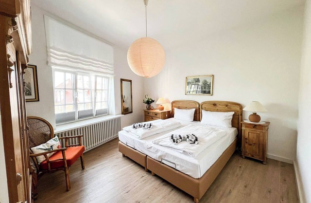 A city villa with spacious and tastefully furnished vacation apartments.