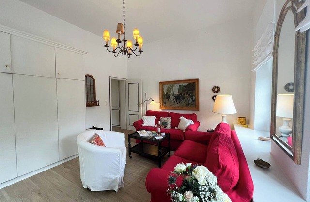 A city villa with spacious and tastefully furnished vacation apartments.