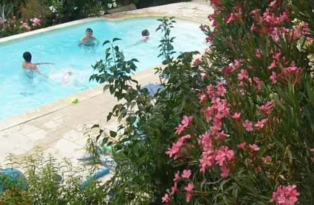 a little corner of paradise with its swimming pool on a vast estate