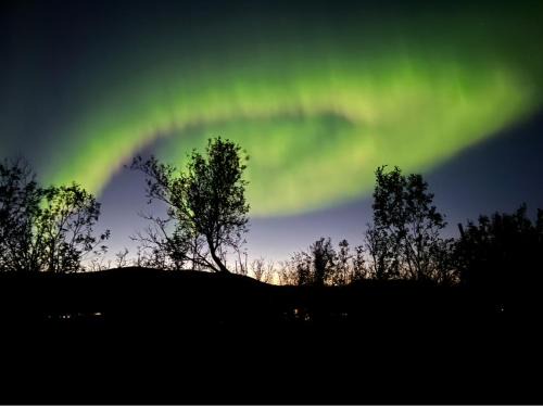 A place for Aurora in wintertime and midnight sun in summer-time!
