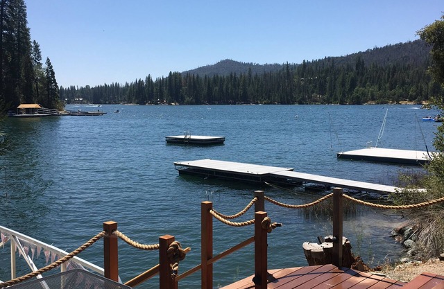 A private dock, secluded cove, large deck, lots of parking, amazing lake view.