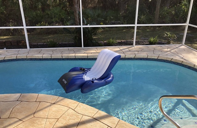 Affordable, Spacious Heated Pool Home in Quiet setting, yet Close to Everything