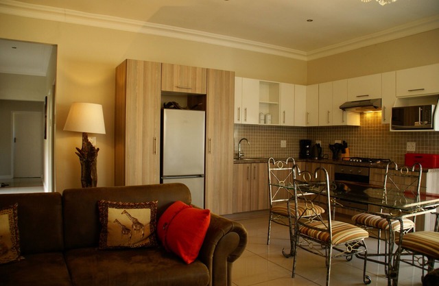 African Palm Red cottage