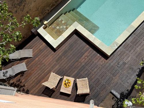Air-conditioned authentic village house with sea view, terraces and swimming pool