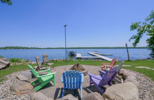 Amazing lake home on level lot with loft above garage paddle boat