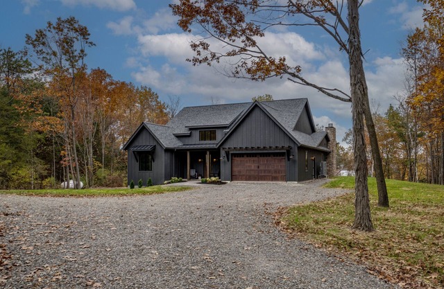 Among the Oaks: Newly built Luxury home with game room, wooded setting overlooking Seneca lake