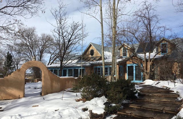 An Elegant Taos Adobe under the Trees