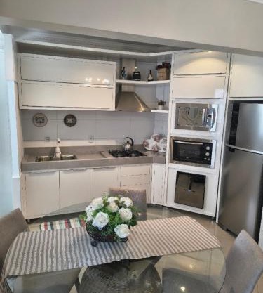 Apartamento aconchegante com ar, secadora e adega