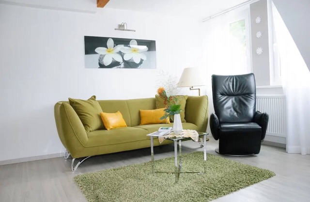Apartment 'Ferienwohnung Am Bannwald 1' with Private Terrace, Shared Garden and Wi-Fi