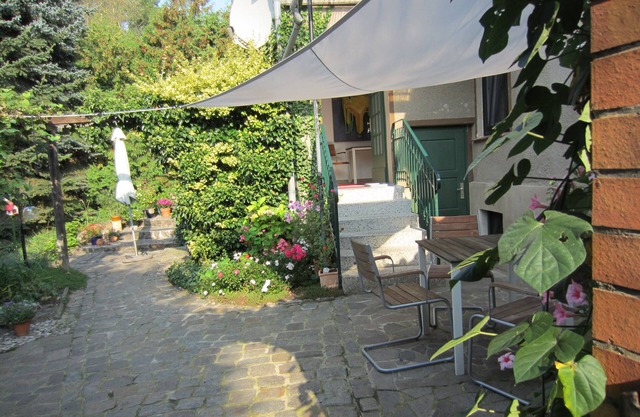 Apartment in a family house on 4 500 sqm plot