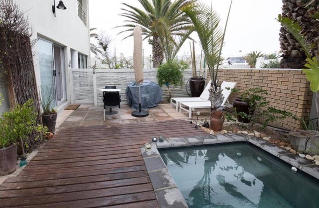 Apartment Melkbos Moments-Apartment with a Pool View