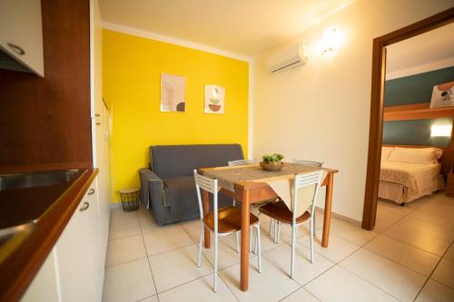 Apartment ulivo with pool and private beach