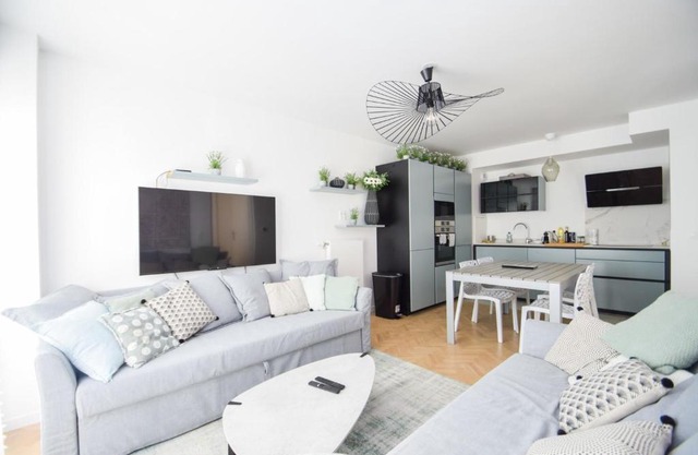 Appt 4 pers dans un immeuble neuf avec jardin WIFI direction Paris