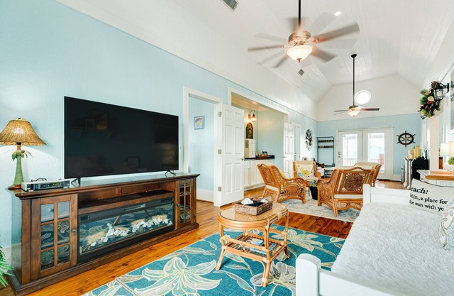 Bay and gulf-view home with gas grill, deck, and outdoor seating area