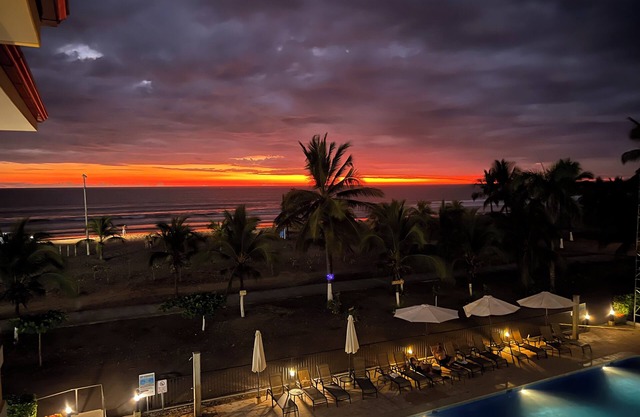 Beachfront condo with rooftop patio and amazing views in the heart of Jaco .