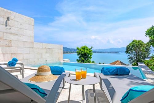 BEACHSIDE VILLA - CARA - 3 BDR VILLA plus 1 BDR APARTMENT at SUNSET COVE BAY with SEA and MOUNTAIN VIEWS, 100 meters to the Swimming Beach