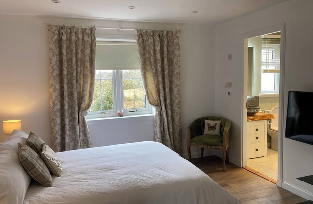 Beautiful garden apartment surrounded by woodland and fields.