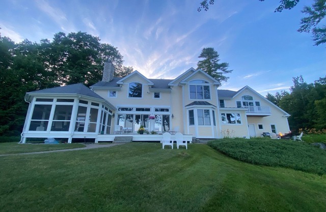 Beautiful Lake Winnipesaukee home with private beach and 60 foot dock