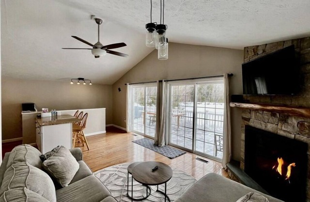 Beautiful lakefront! Private, sandy beach. Fire pit. Parking. Two living areas.