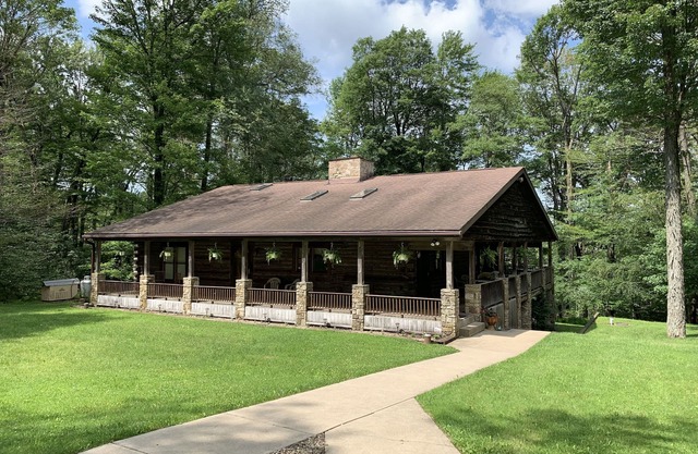 Beautiful log home retreat located on the Northwest peak of PA/New York boarder