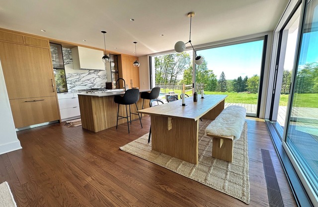 Beautiful renovated home with wooded trail along stream & gorgeous views of lake