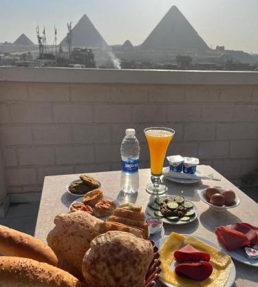 Behind BoutiQue Pyramids Hotel