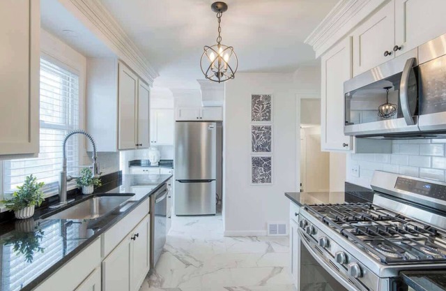 Bright 3BR Retreat w/4-Season Sunroom & Modern Touches