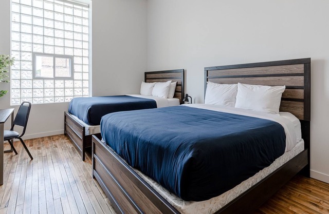 Bright, Comfortable Condo with Amazing Rooftop Deck! Perfect Location by RedAwning