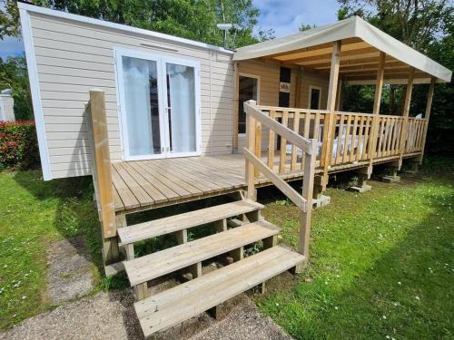 Bungalow charmant pres de Pont Aven avec piscine partagee