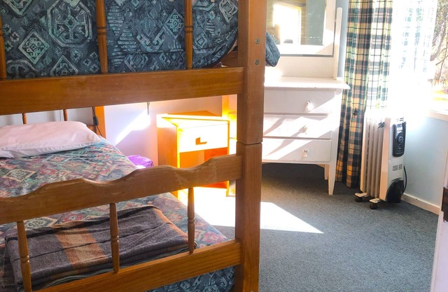 Cabin 9 has two separate rooms & sleeps 4. Guests have access to all amenities