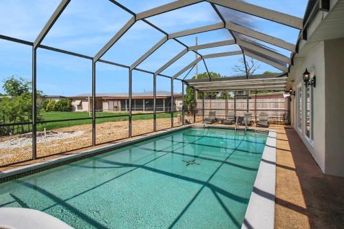 Canal-Front Escape with Private Pool & Game Room in Port Charlotte