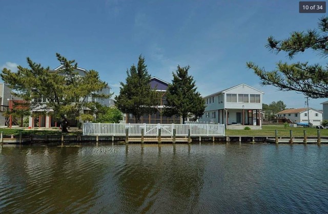 Canal Front Home w/Dock & Fence. 5 Min walk to the beach! Pet Friendly w/fee