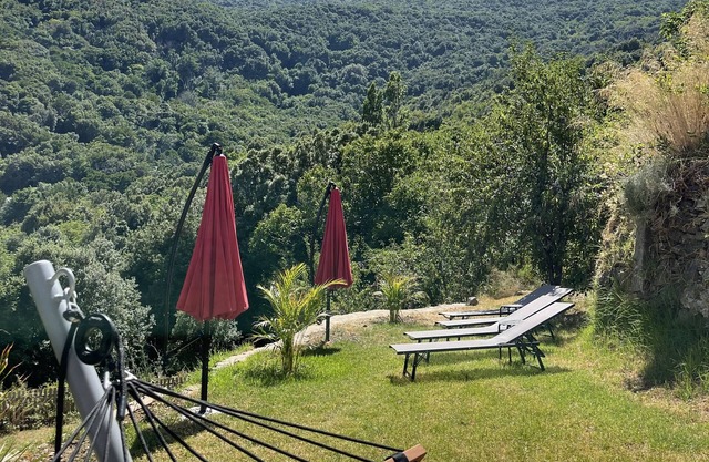 Cap Corse, Sisco. Apartment in stone village house with sea view