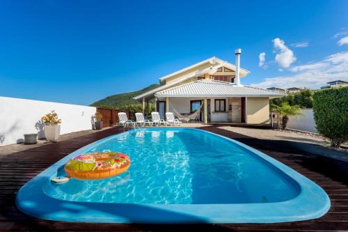 Casa com piscina frente ao mar Praia do Santinho