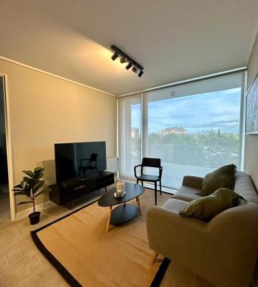 Central depto 2 dormitorios en distrito Icono