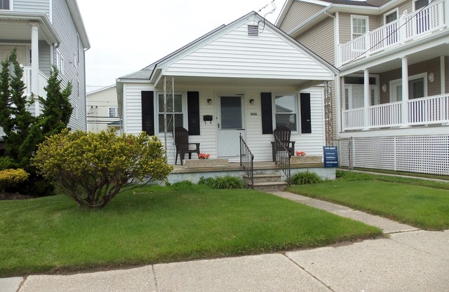 Centrally located near downtown shopping and restaurants and just a short walk to the beach and boardwalk. Large rear parking pad for 4 cars, picnic table and a fun basketball net in back too!