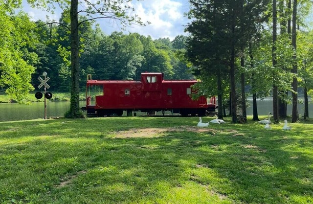Charming Caboose-turned-tiny home on lake
