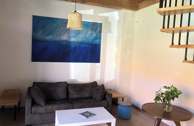 Charming house between land and sea in a green setting