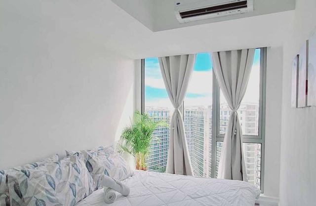 Chic 2-bedroom condo with AC, WiFi in enchanting Parañaque