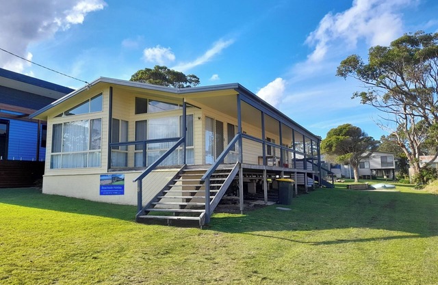 Classic south coast beach house with beach, forest and a lake on the doorstep