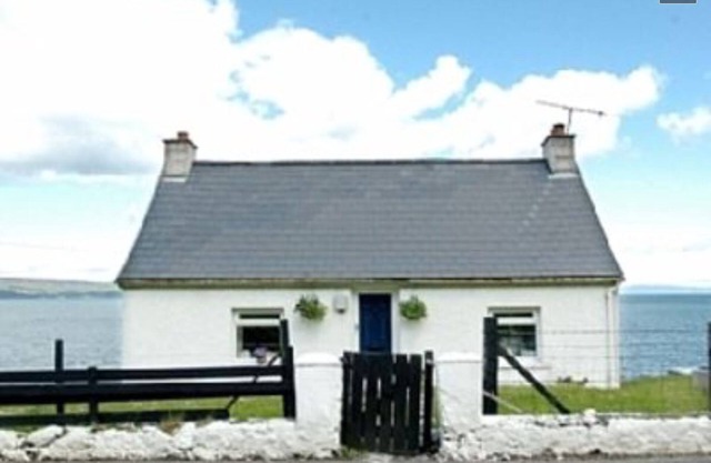 Coastal cottage , historic and award winning, absolute ocean front rural glens