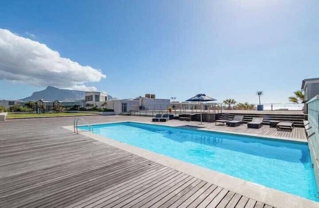 Coastal Escape with Stunning Mountain Backdrop
