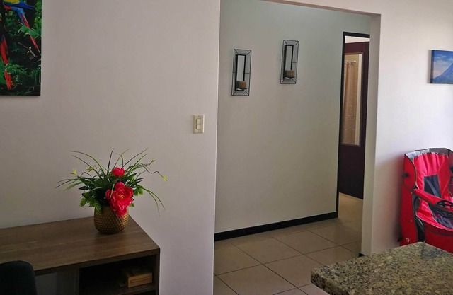 Comfy, modern and secure spot in gated community near airport and city