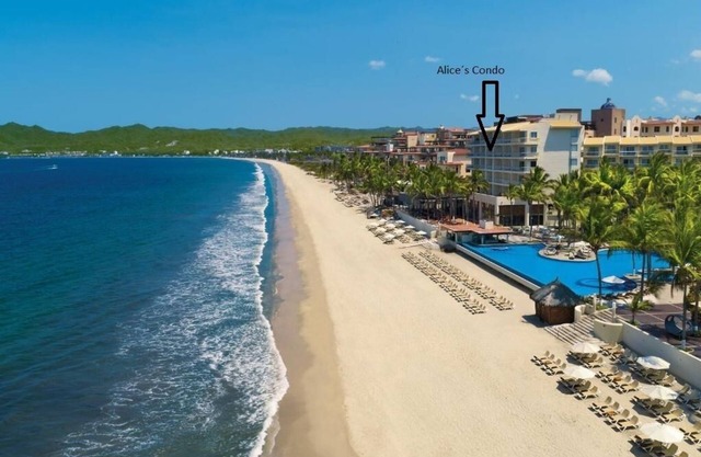Condo at front of the beach inside a Resort compound hotel.